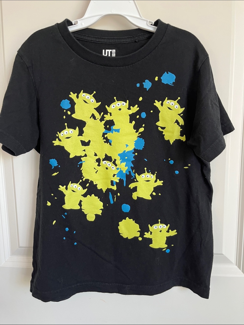 Uniqlo Kids Black Tee with Neon Green Alien Print and Blue Splatter